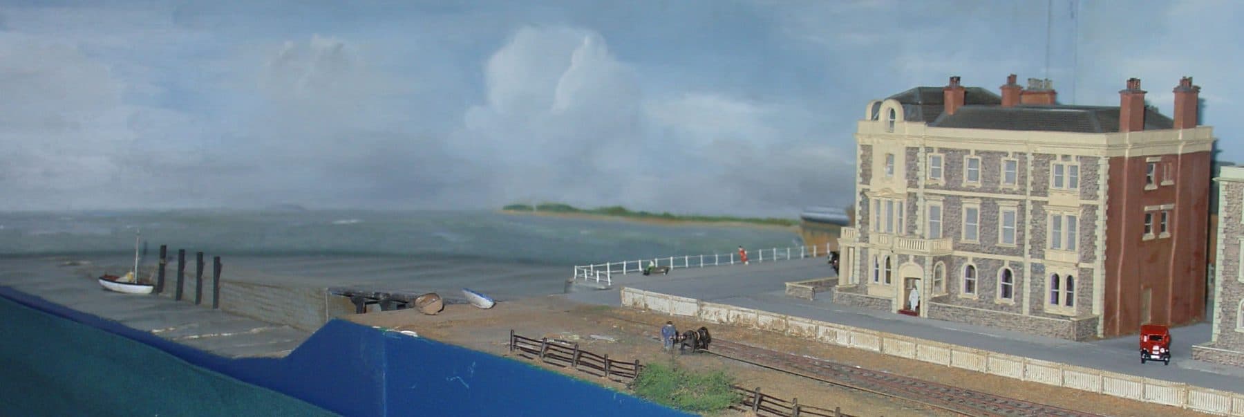 The jetty and the seafront, with the hotel beside the station