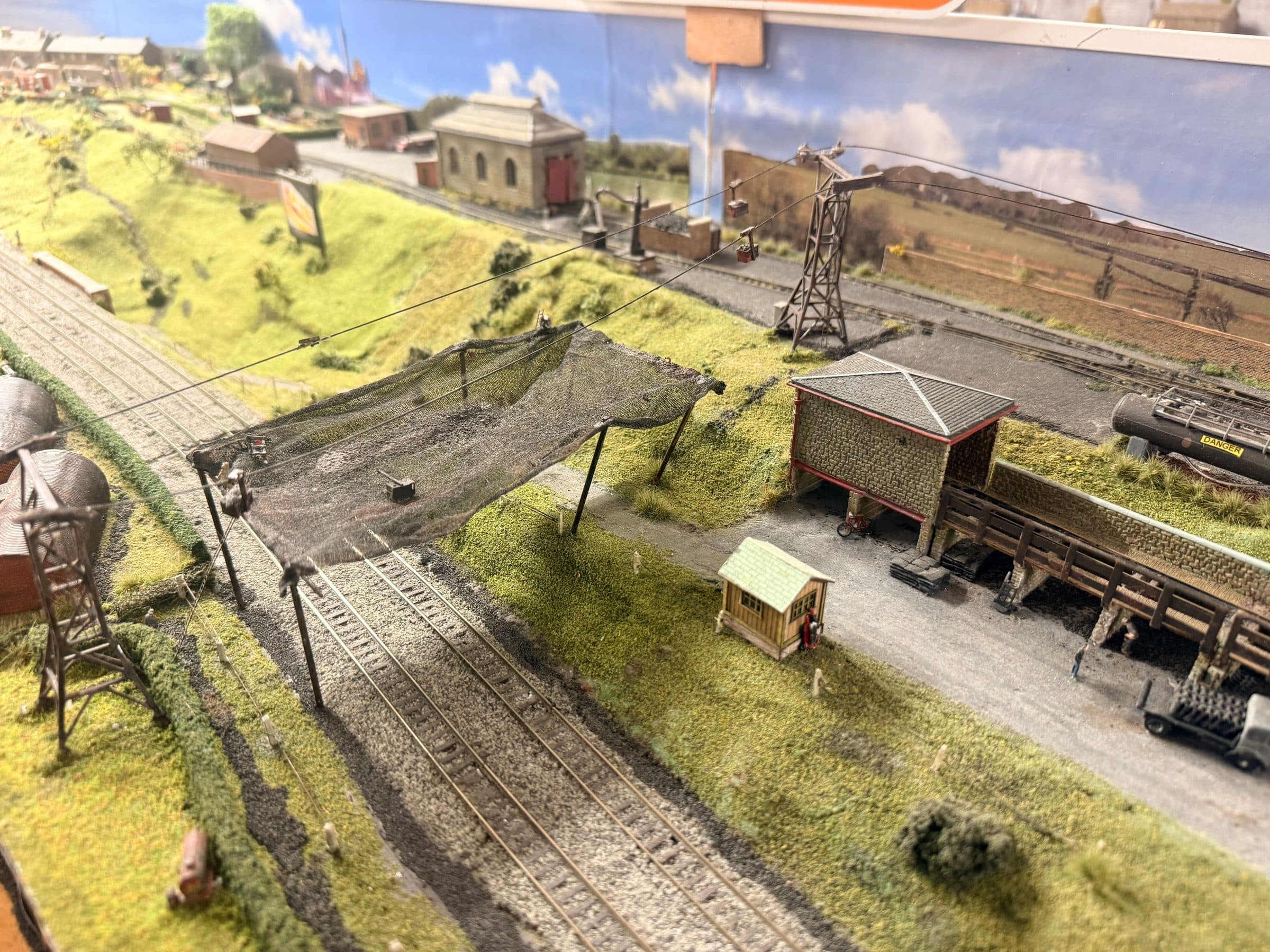 The aerial ropeway crossing the main line, with the colliery screens and sidings beyond